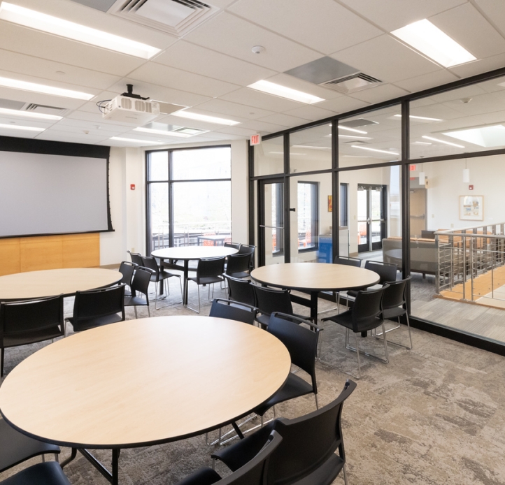 Zemsky presentation room with tables and chairs