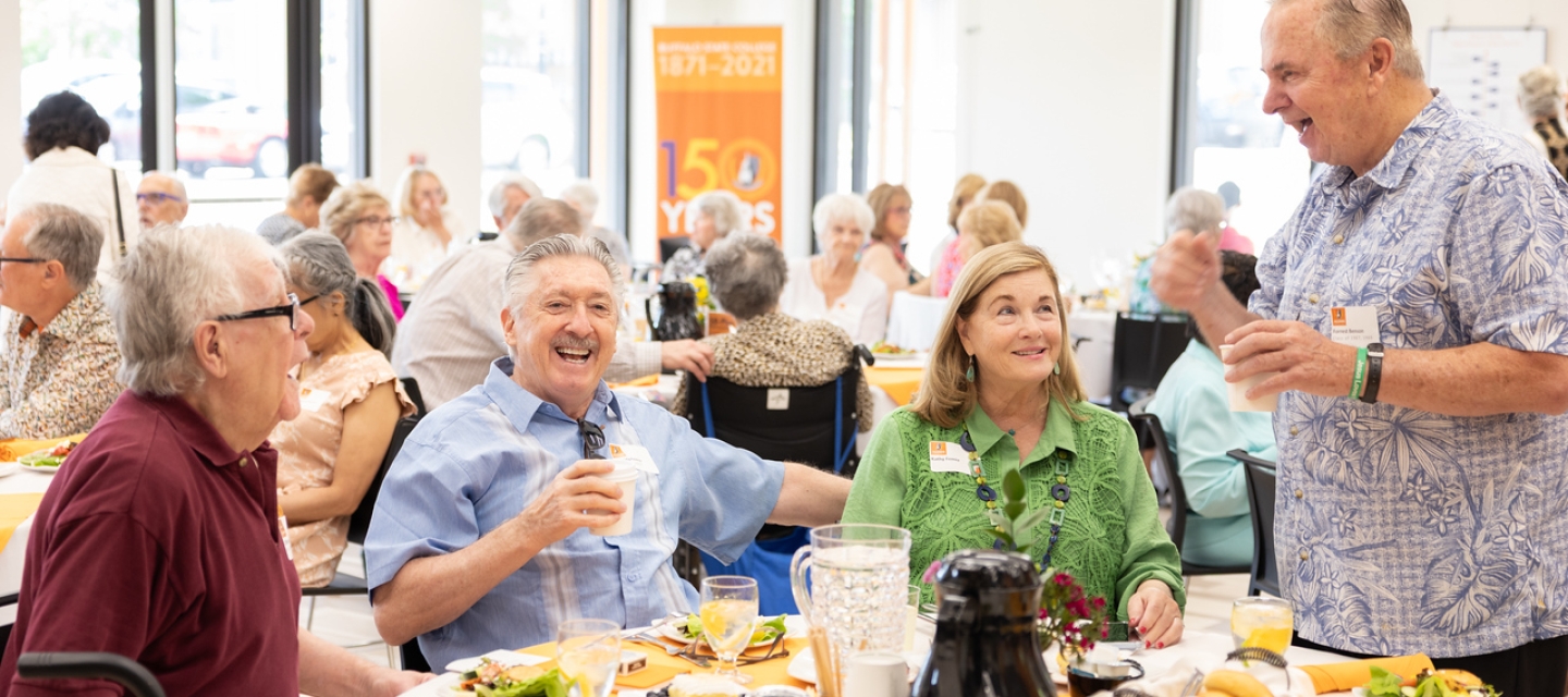 Alumni gathered around lunch table